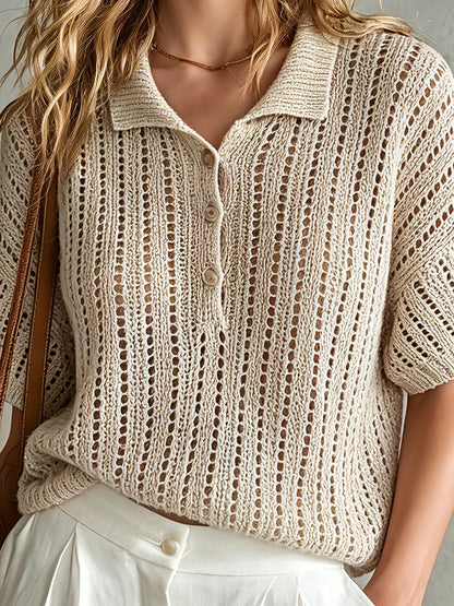 Beige knitted cardigan worn by a person with a neutral background