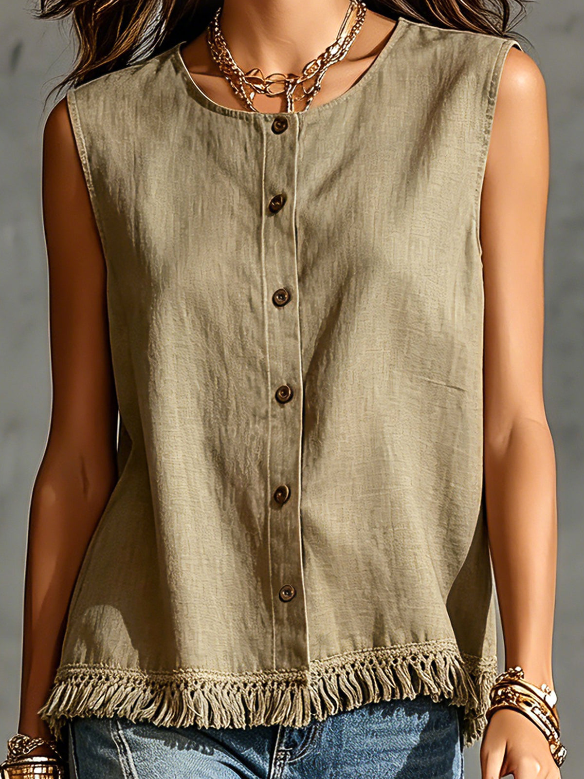 Light brown sleeveless top with buttons and frayed hem on a neutral background